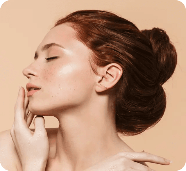 Woman's head turned to the side with serene expression